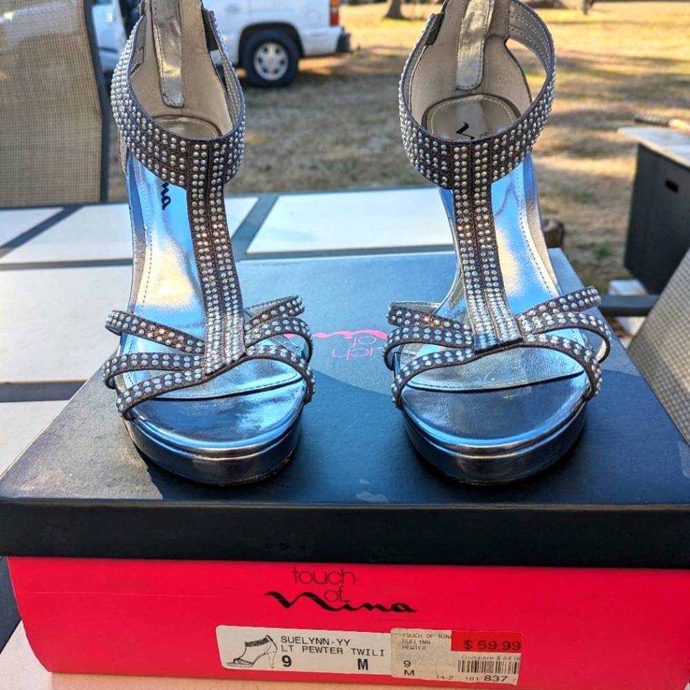 GORGEOUS 😍 Nina size 9 Sleek silver small studs , back heel zipper , High heel